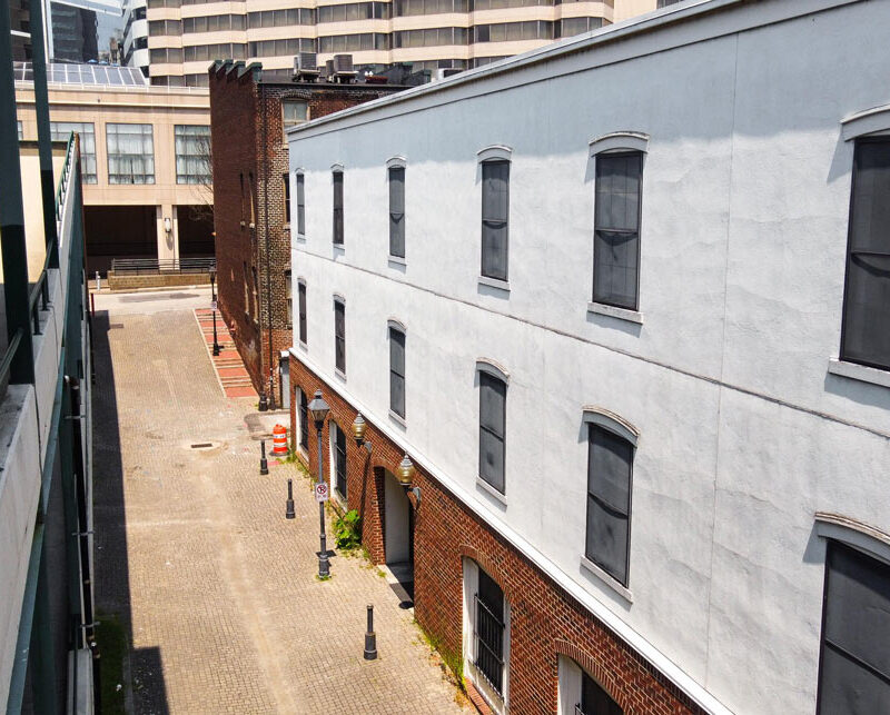 Exterior of alley next to apartment building